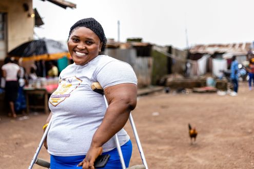 Person standing on crutches